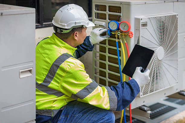 Professional Hvac technician working in Marshfield, MA